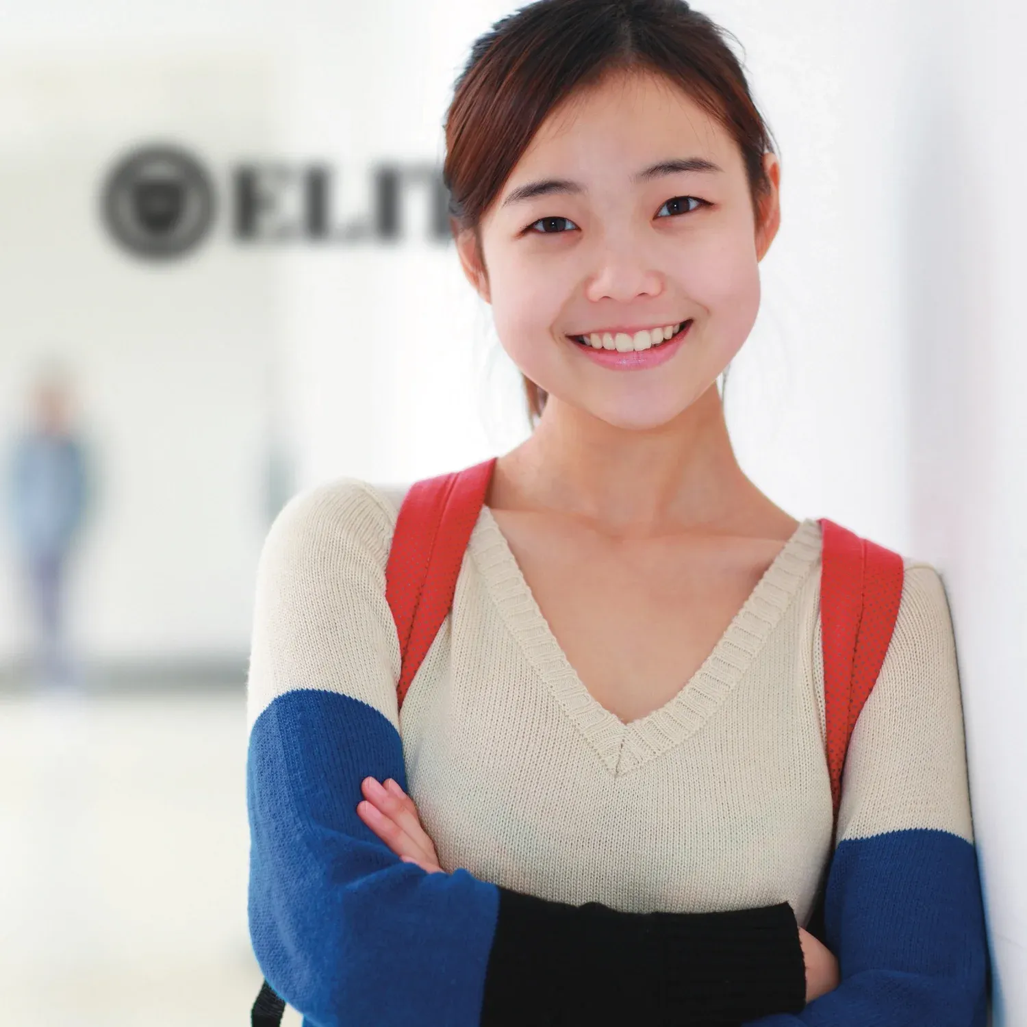 A student walking through the hallway of an Elite Prep center.